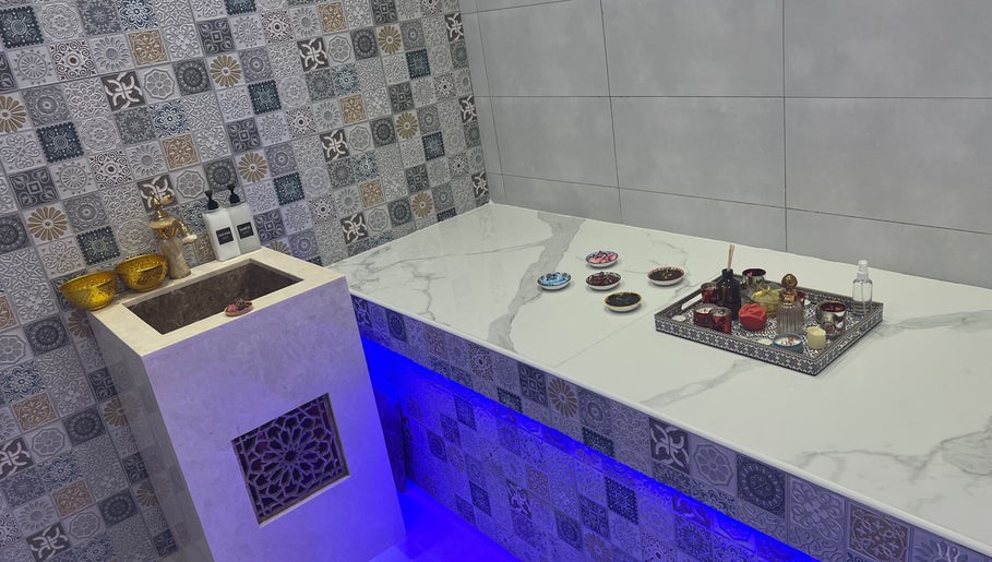 Elegant Moroccan-style decor at Bella Donna Saloon, Ajman, Ajman, AE with ornate tiles and beauty products.