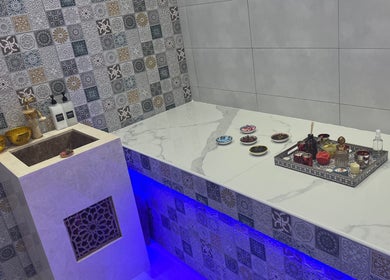 Elegant Moroccan-style decor at Bella Donna Saloon, Ajman, Ajman, AE with ornate tiles and beauty products.