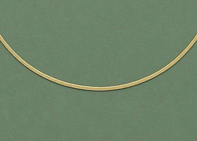 Gold line on green background representing elegance at By Shanelle, Glasgow, Scotland, GB.