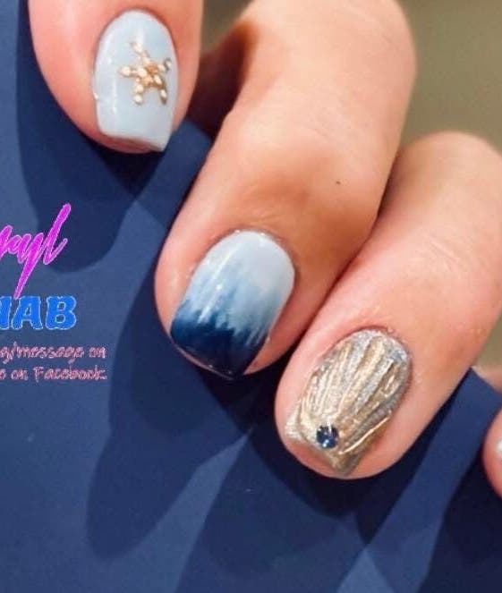 Intricate nail art at Gels Caryl in Nefyn, Cymru, GB showcasing creative gel designs and BIAB style.