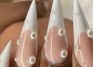 Elegant pearl-studded nails at Mami beauty bar in Alberton, Gauteng, ZA.