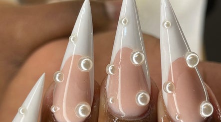 Elegant pearl-studded nails at Mami beauty bar in Alberton, Gauteng, ZA.