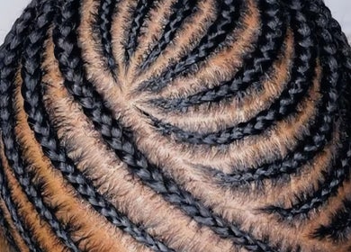 Intricate braid pattern at Mami beauty bar, Alberton, Gauteng, ZA, showcasing expert hairstyling.