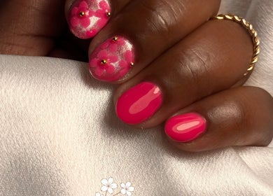 Pink floral nail art at Mami Beauty Bar, Alberton, Gauteng, ZA. Perfect for a chic, vibrant look.