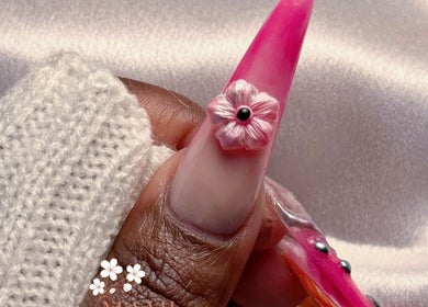 Elegant floral nail art at Mami beauty bar, Alberton, Gauteng, ZA. Perfect blend of pink and 3D flower design.