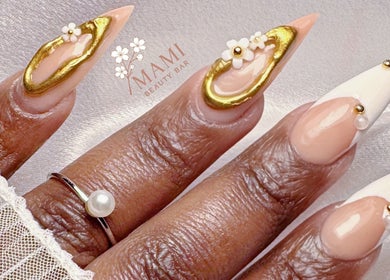 Intricate gold and floral nail art at Mami Beauty Bar, Alberton, Gauteng, ZA.