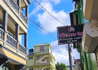 Street view near The Beauty Cuisine in Roseau, Saint George Parish, DM with surrounding architecture.