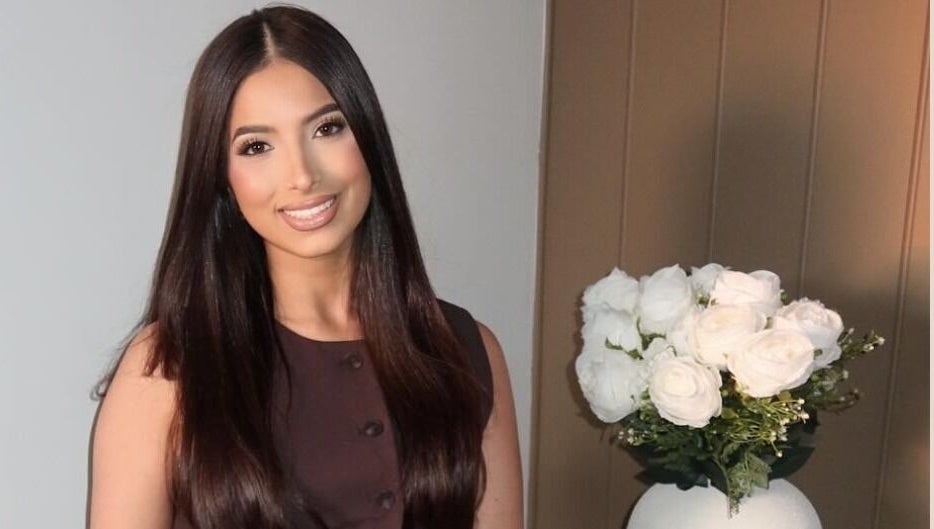 Warm welcoming interior of Glow by Jacinda, Gledswood Hills, NSW, with elegant floral decor.