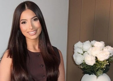 Warm welcoming interior of Glow by Jacinda, Gledswood Hills, NSW, with elegant floral decor.