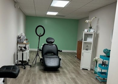 Modern beauty room in 'Lashes Forevermore', Hiram, Georgia, US with chair and organized decor.