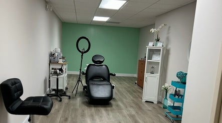 Modern beauty room in 'Lashes Forevermore', Hiram, Georgia, US with chair and organized decor.