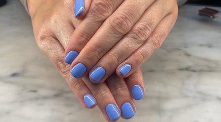 Elegant blue nails manicure at Nailcita_bysim, London, England, GB, showcasing professional nail care.
