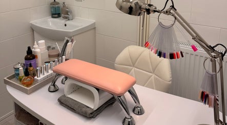Elegant nail station at Nailcita Bysim, Hornchurch, England, GB, displaying manicure tools and polish.