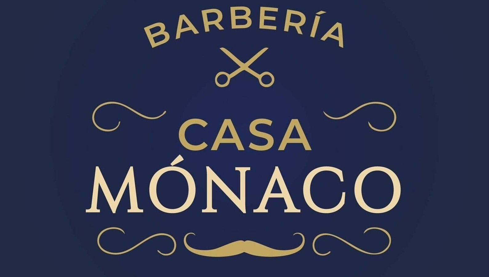 Logotipo dorado de Casa Mónaco en Cuenca, Azuay, EC con diseño de tijeras y bigote.