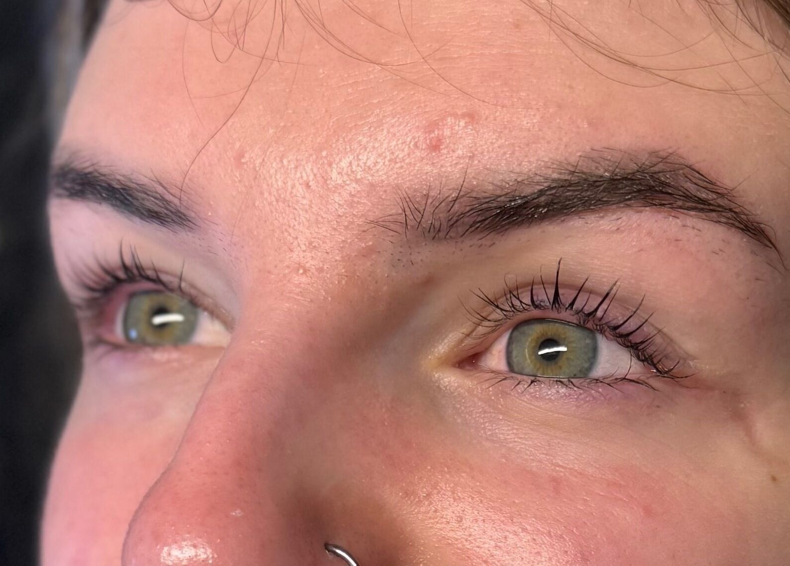 Close-up of perfectly shaped eyebrows and lashes at Brows By Ru, Royal Wootton Bassett, England, GB.