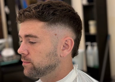 Close-up of a man with a fresh fade haircut at Hdcutz Leo, London, England, GB.