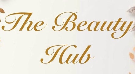 Stylish logo of The Beauty Hub, Dublin 22, IE, with elegant script and soft leaf accents.