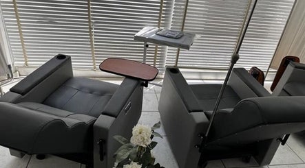Luxurious reclining chairs at Medera in Sliema, MT offer comfort and elegance in a relaxing setting.