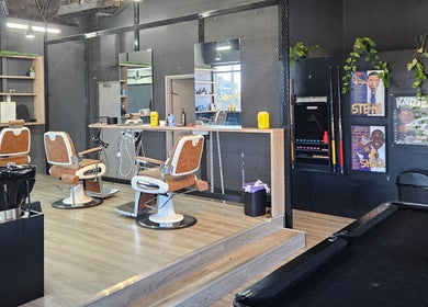 Interior view of Lux Barbershop in Cockburn Central, Western Australia, AU featuring modern barber chairs and decor.