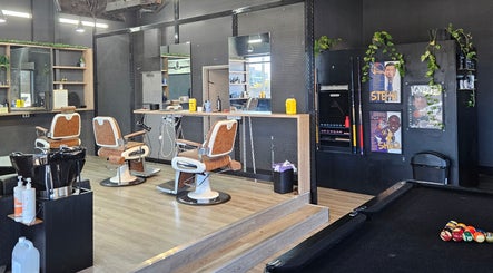 Interior view of Lux Barbershop in Cockburn Central, Western Australia, AU featuring modern barber chairs and decor.