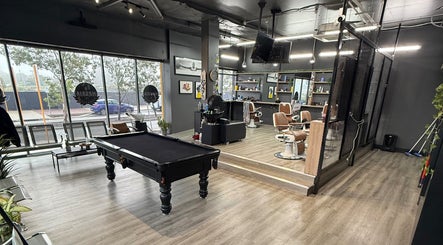 Interior of Lux Barbershop, featuring plush chairs and pool table, Cockburn Central, Western Australia, AU.