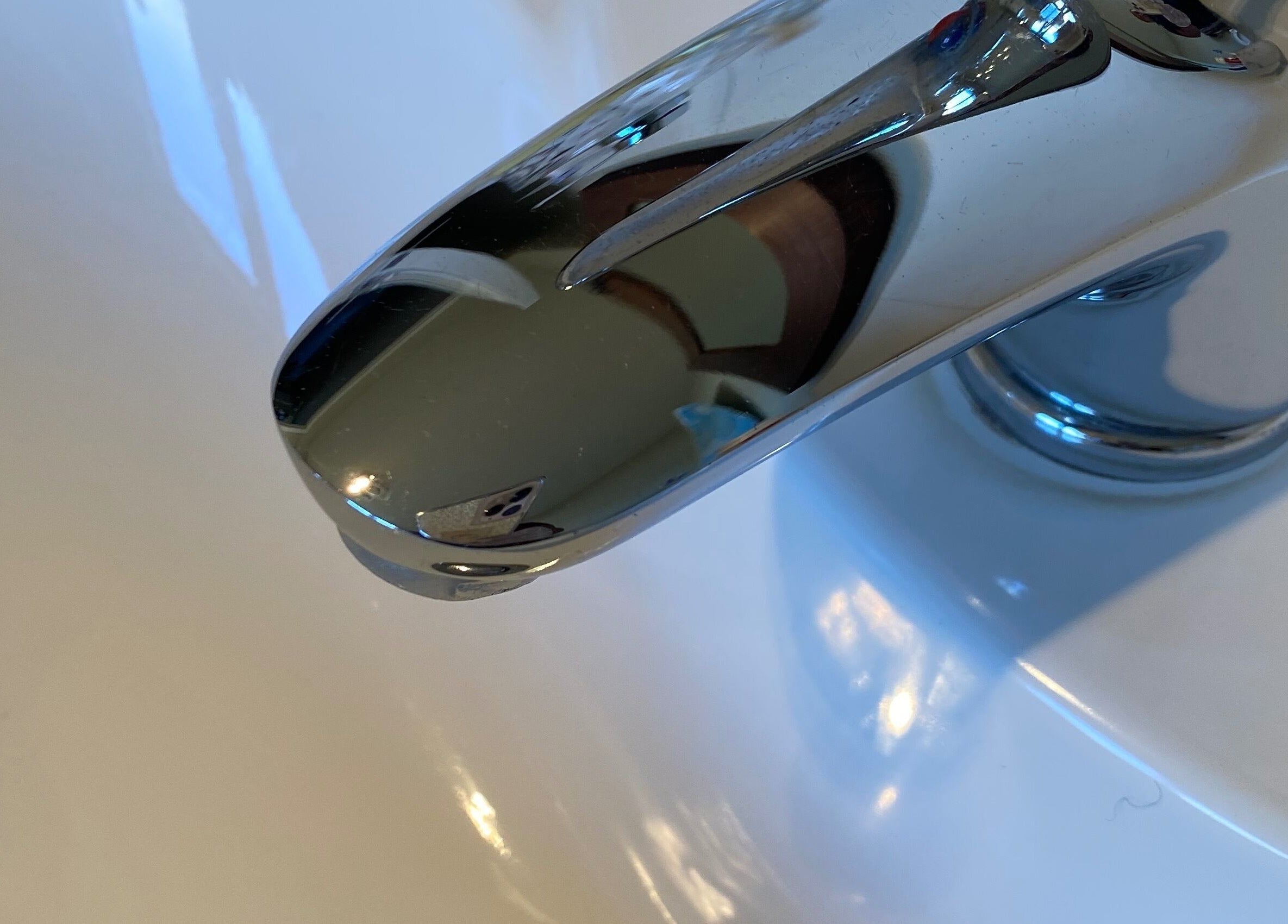 Shiny chrome faucet at Mz Joys Cleaning Service, Mamaku, Bay Of Plenty Region, NZ, showcasing pristine cleaning.