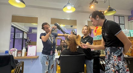 Stylists working on a client's hair at Baratto Salon, City Of Santa Rosa, Calabarzon, PH.