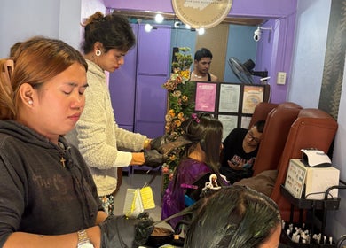 Stylists coloring hair at Baratto Salon in City Of Santa Rosa, Calabarzon, PH. Vibrant ambiance enhances the experience.