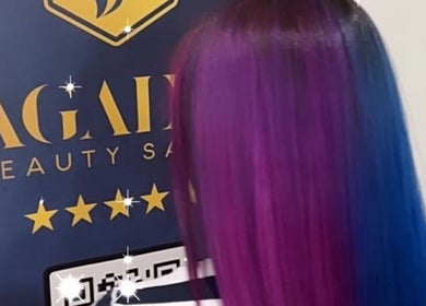 Vibrant purple and blue hair styled at Agalya Beauty Salon, Charlotte, North Carolina, US.