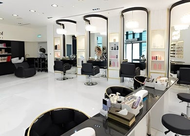 Chic interior of Helin Eren Beauty Hair Spa in Dubai, Dubai, AE, showcasing modern salon chairs and decor.