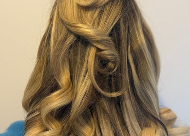 Elegant blonde curls styled at Hair By Maddison MBM, Newcastle upon Tyne, England, GB.
