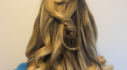 Elegant blonde curls styled at Hair By Maddison MBM, Newcastle upon Tyne, England, GB.
