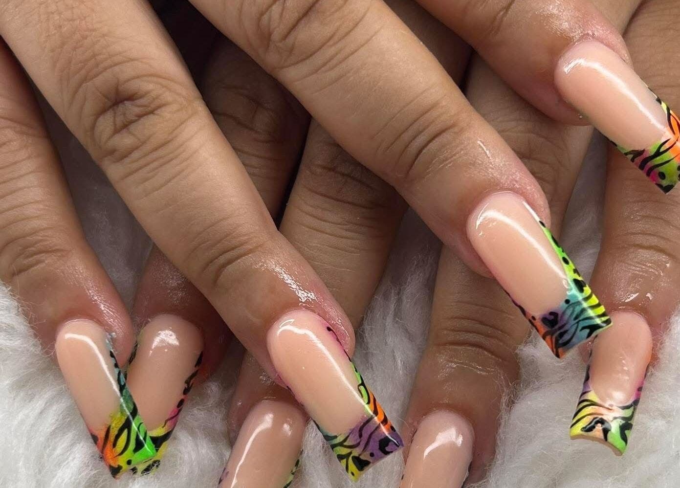 Vibrant neon nail art design at ABL Nails in Erie, Pennsylvania, US, showcasing creative manicure work.