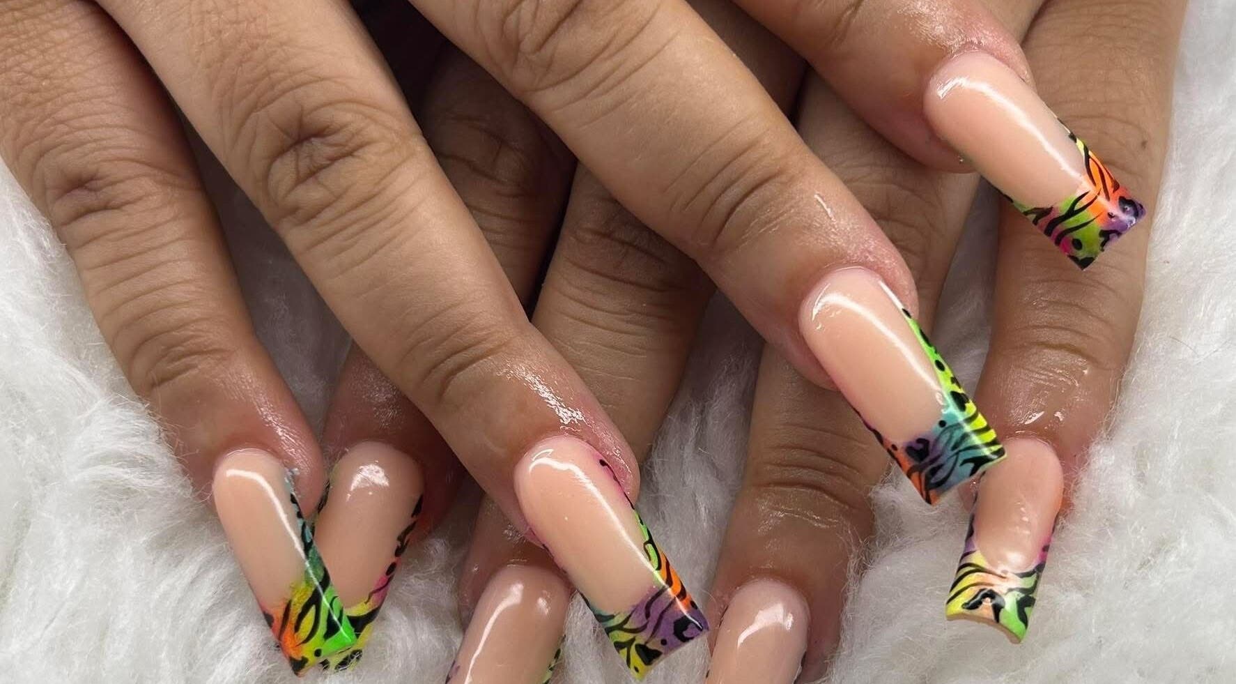 Vibrant neon nail art design at ABL Nails in Erie, Pennsylvania, US, showcasing creative manicure work.