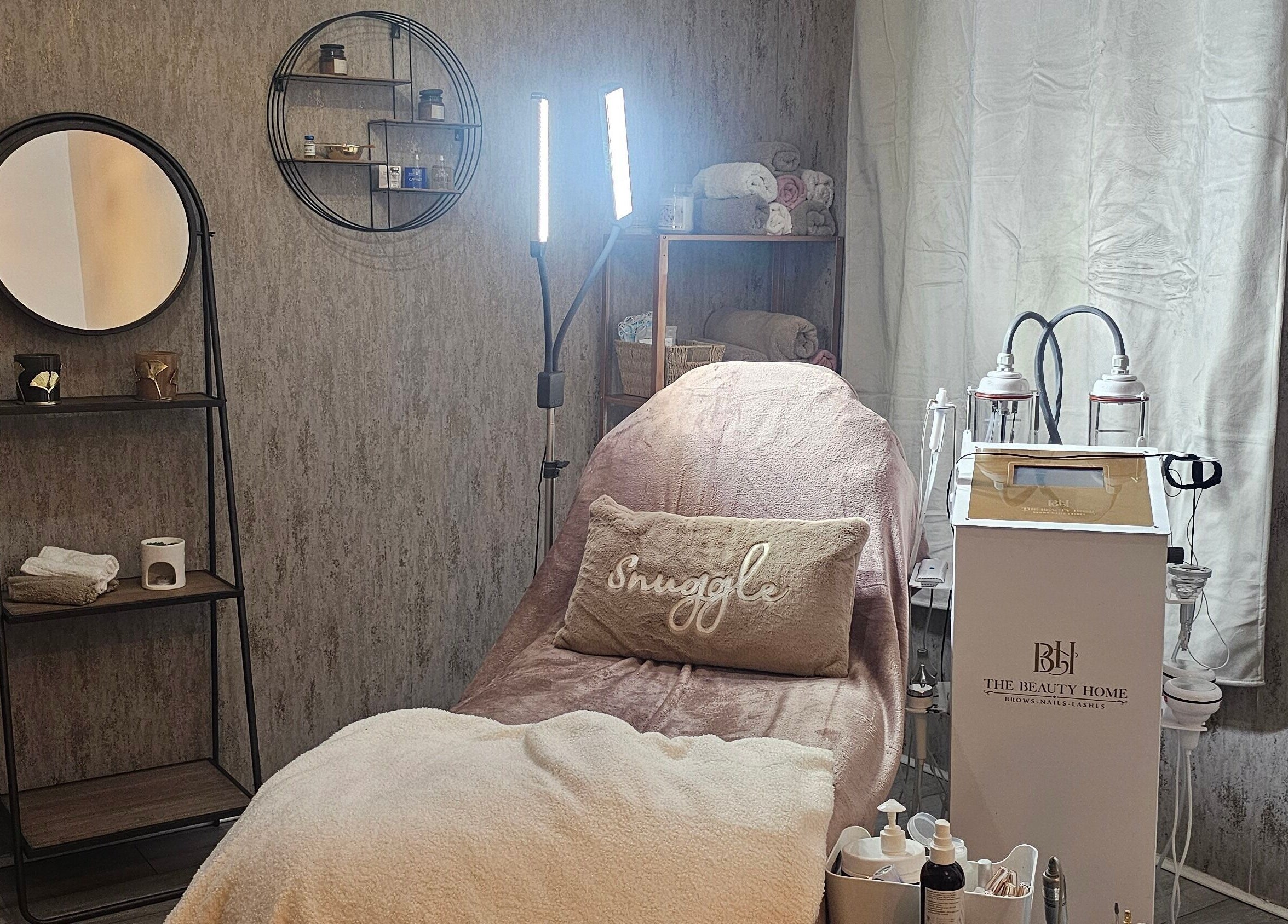 Cozy treatment room at Beauty Home in Edinburgh, Scotland, GB with plush decor and professional equipment.