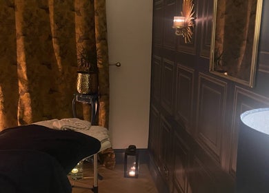 Relaxing spa room in The Wellness Room by Sarah-Jane in Colchester, England, GB with a treatment bed and warm lighting.