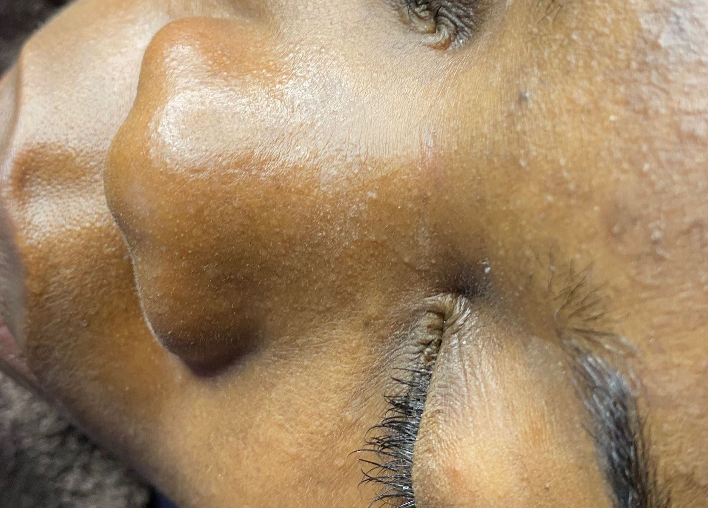 Close-up of a serene face with closed eyes after a pampering session at Lash N Wax, Sandton, Gauteng, ZA.