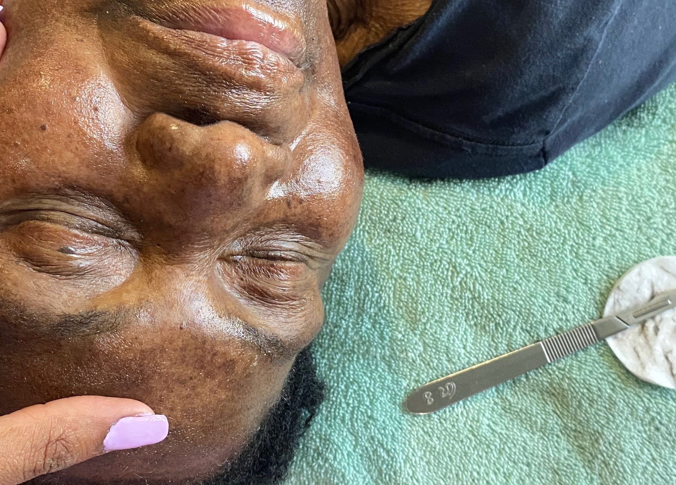 Client receiving a calming facial treatment at Lash N Wax, Sandton, Gauteng, ZA.