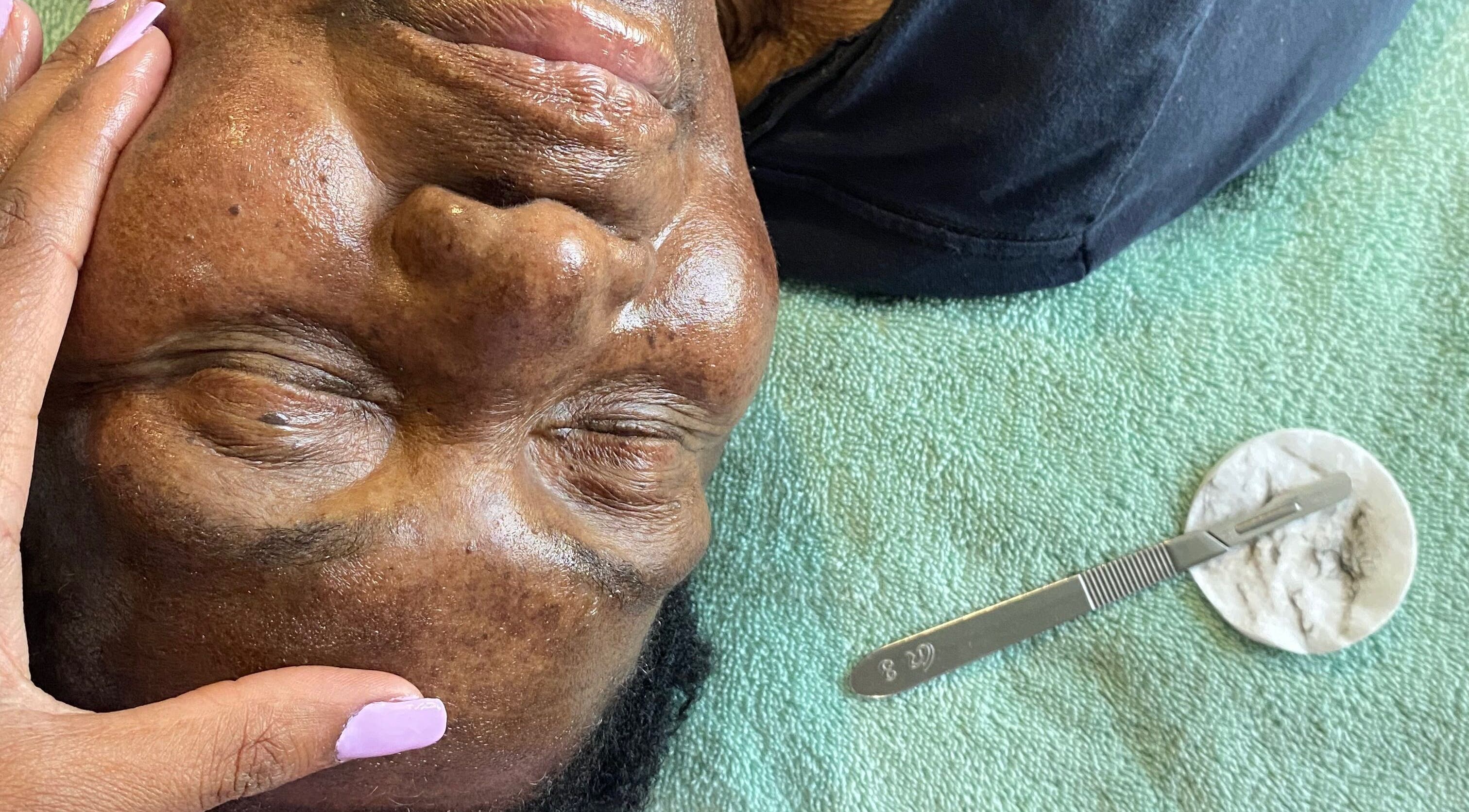 Client receiving a calming facial treatment at Lash N Wax, Sandton, Gauteng, ZA.