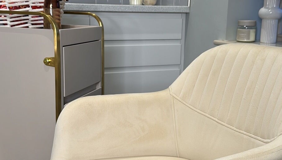 Beige chair in modern setting at The Tape Studio, Huddersfield, England, GB.