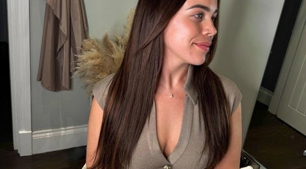 Woman with sleek hair at The Tape Studio in Huddersfield, England, GB, showcasing a trendy beauty look.