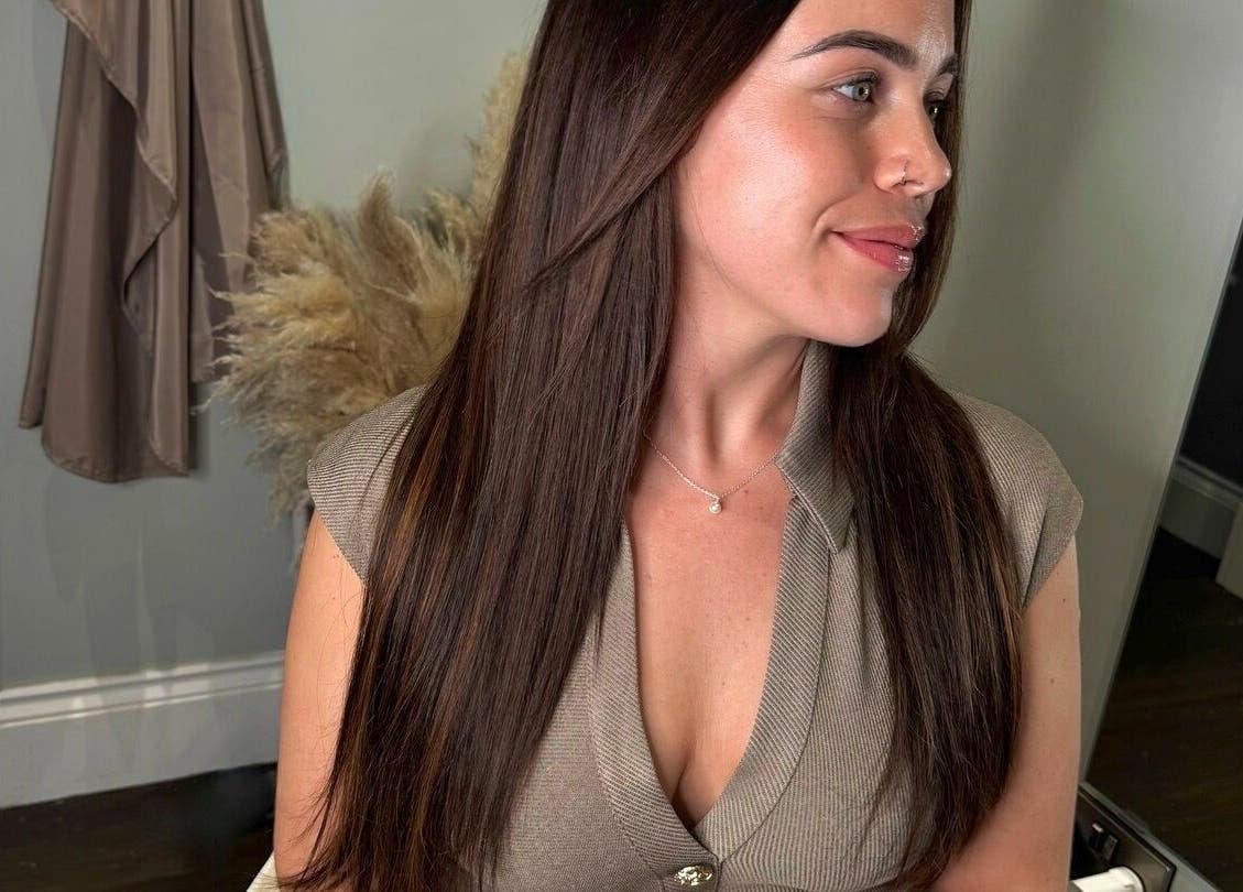 Woman with sleek, long hair at The Tape Studio, Huddersfield, England, GB, showcasing beauty and style.