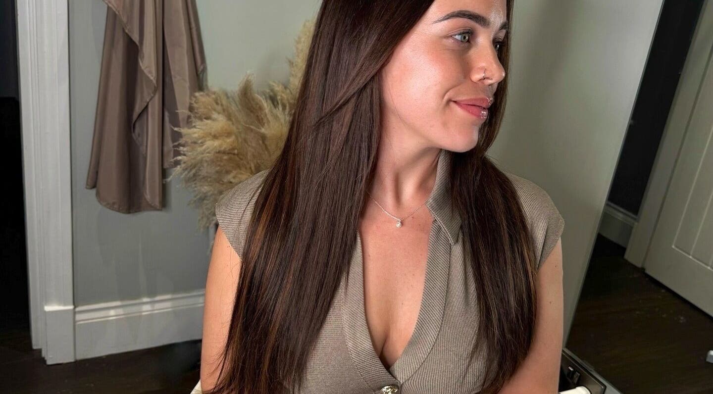 Woman with sleek, long hair at The Tape Studio, Huddersfield, England, GB, showcasing beauty and style.