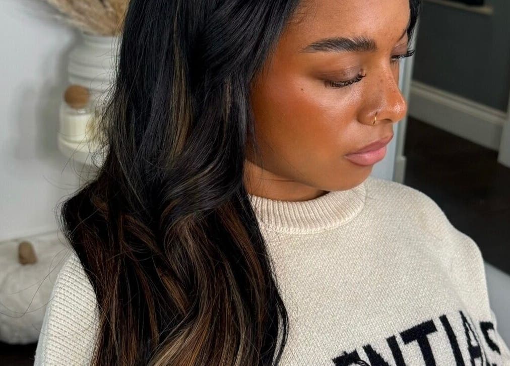 Beautiful hair styling at The Tape Studio, Huddersfield, England, GB, showcasing silky, dark curls.