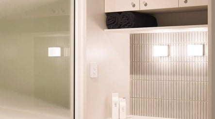 Elegant bathroom vanity at Studio SixtyThree, Innaloo, Western Australia, AU features sleek design and soft lighting.