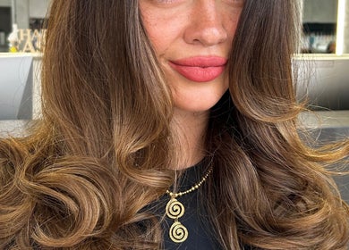 Stylish brunette curls at Studio SixtyThree, Innaloo, Western Australia, AU creating an elegant salon effect.