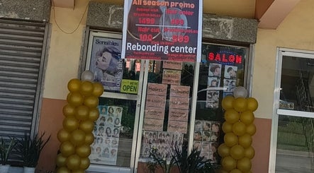Front entrance of Touch of a&j salon in Cabuyao City, Calabarzon, PH with promotional signs and golden balloons.