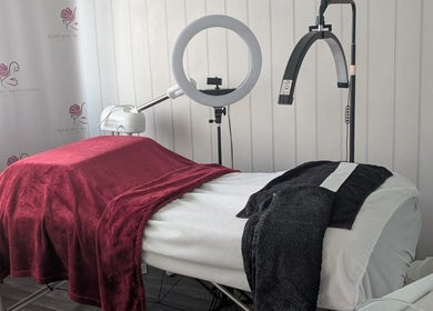 Elegant treatment room at Radiant Reflection, Coventry, England, GB showcasing plush linens and equipment.