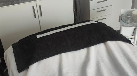 Relaxing treatment table at Radiant Reflection, Coventry, England, GB, ideal for a calming wellness experience.
