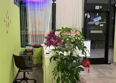Inviting entrance of Footy Rooty Massage Huntsville AL with vibrant decor in Huntsville, Alabama, US.